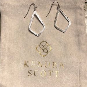 Kendra Scott earrings.